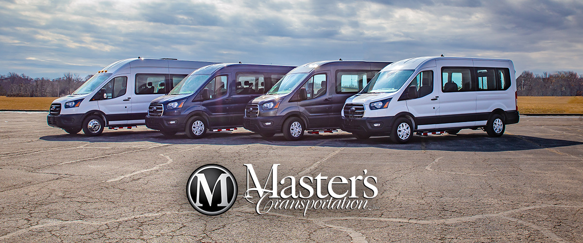 Group of new vans parked near Master's Transportation's Denver location