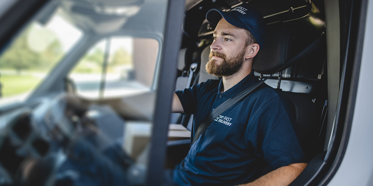 Male delivery driver using a commerical van for product deliveries in St. Louis, MO