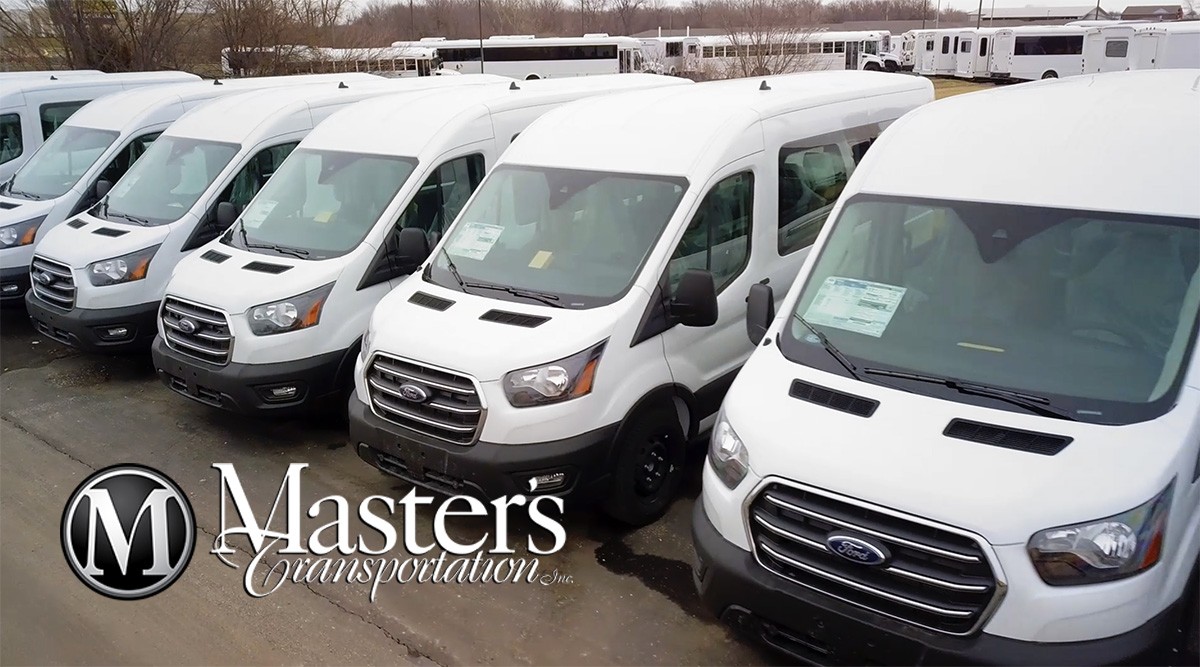 Group of new 10 passenger commercial vans for sale at Master's Transportation